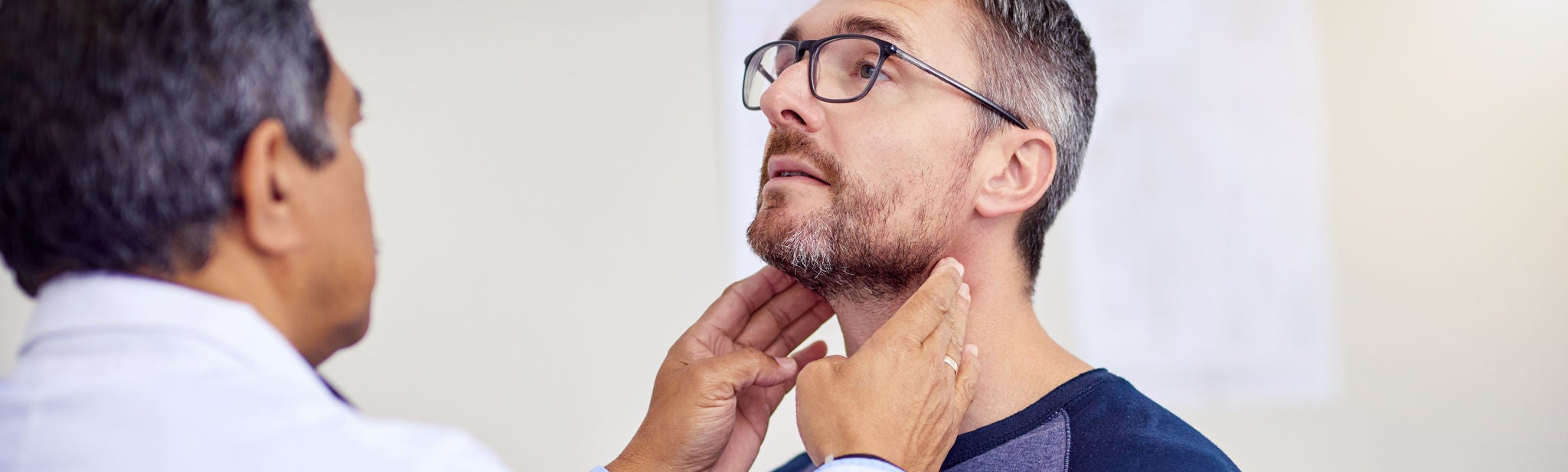 Throat doctor with patient