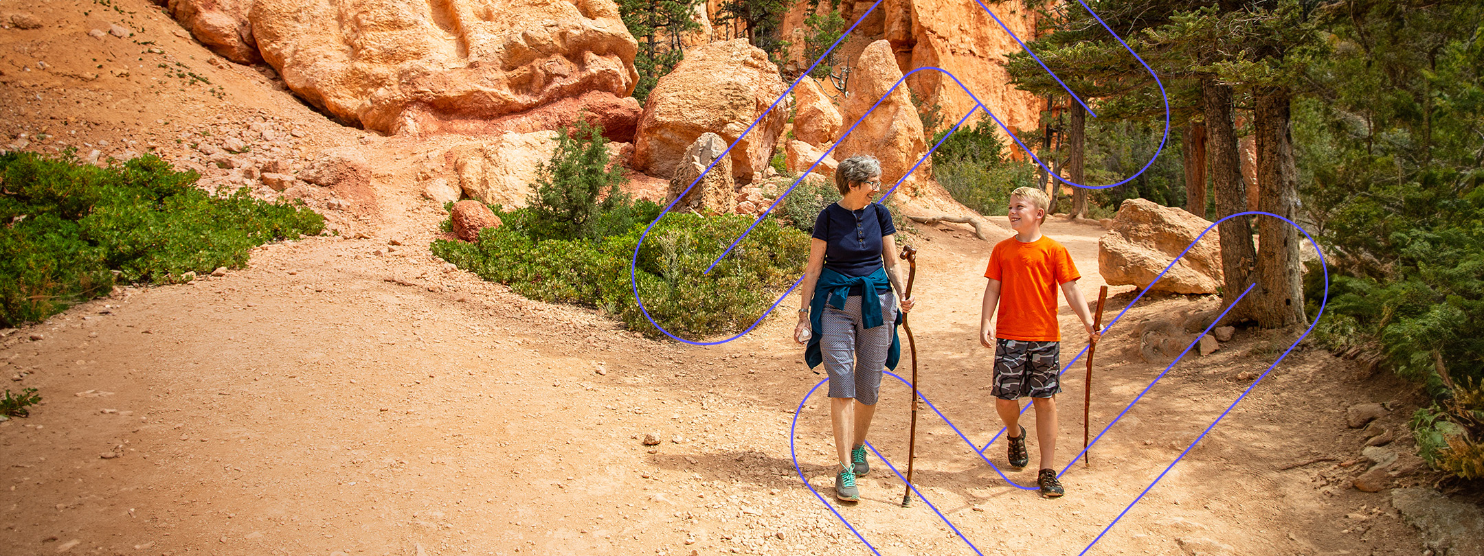 woman and grandchild hiking in the orange mountains
