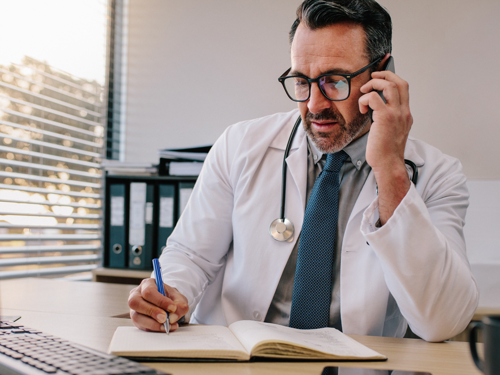 Doctor speaking on a cellphone